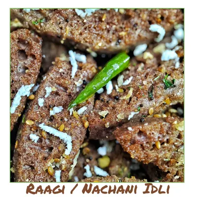 My fluffy and healthy Ragi Idli, also known as Nachani Idli. Made from finger millet, this is a nutritious and tasty snack, garnished with grated coconut and green chilli.