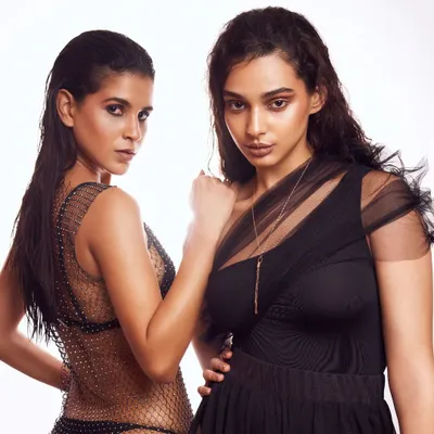 For this fashion shoot, I created complementary looks for two models, featuring a wet-hair look and bronzed, glowing skin. The makeup is minimal yet striking, perfect for a modern editorial that focuses on natural features.