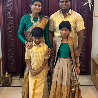 It was a pleasure styling this beautiful family for Pongal. We worked on a coordinated color theme of green and gold, choosing a traditional silk saree for her and classic shirts and veshti for him and the kids, creating a perfect family portrait.