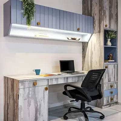 A stylish home office with a rustic, distressed wood finish. The design includes ample overhead storage cabinets with integrated lighting and a spacious desk for a comfortable work environment.