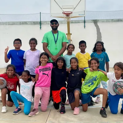 Leading a group of young girls at a summer camp in Yelahanka. My youth basketball programs are designed to be fun, engaging, and focused on building a strong foundation of skills from an early age.