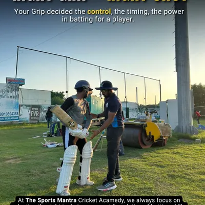 A strong foundation starts with the correct grip. Here, I am providing one on one guidance to a player, adjusting his grip to ensure he achieves better control, timing, and power in his shots.