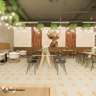 This cafe was designed with a Scandinavian-inspired color palette, using tan and earthy tones. The space features varied seating arrangements, abundant greenery, and unique artwork to create a warm and eclectic atmosphere for patrons.