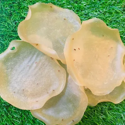 These are my homemade Rice Papads, also known as Khichiya. They are light, crispy, and ready to fry for a perfect meal accompaniment or a standalone snack. The jeera seeds add a lovely aromatic flavor.