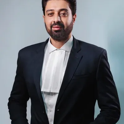 A professional portrait in my advocate's attire. This represents my commitment to the legal profession and my readiness to stand for my clients in court.