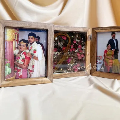 Some memories deserve more than just a photo. This folding frame tells a story, with wedding photos on the outer panels and the preserved varmala, mangalsutra thali, and toe rings in the center.