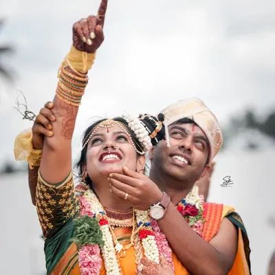 Pure joy during the Muhurtham. We live for these candid moments where the couple's happiness shines through, creating a memory that's both beautiful and completely genuine.
