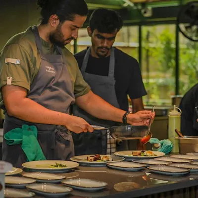 In the kitchen during a busy service. Concentration and teamwork are the keys to a successful private event.
