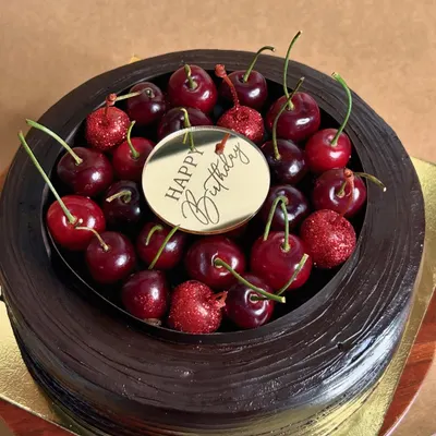 Introducing my season special: the Cherryoclate cake. It's Belgian chocolate paired with the freshest cherries from Himachal. Chocolate sponges are soaked in cherry juice, filled with compote and fresh cherries, and covered in ganache.