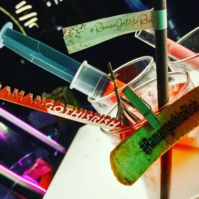 It's all in the details. I provide personalized drink accessories, like these custom stirrers and tags featuring the couple's wedding hashtag.