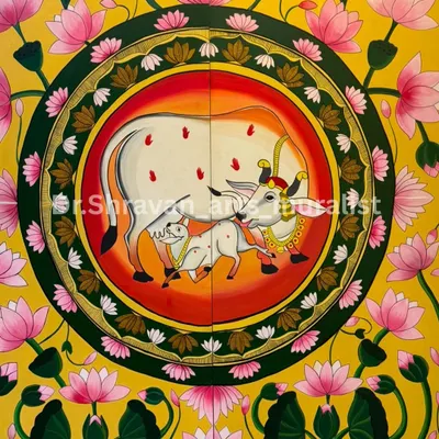 A classic Pichwai painting featuring the sacred cow and calf, surrounded by a circle of lotuses. The vibrant yellow background and intricate details bring a sense of divinity and tradition to the space.