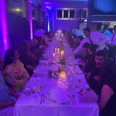 The ambiance of a sustainable farm-to-table dinner we created for Auto Hangar and Motilal Oswal. A long table, candlelight, and exquisite food make for a memorable evening.