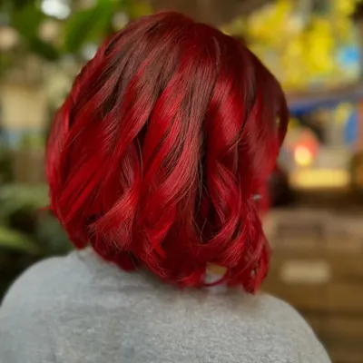 Another look at this fiery red bob. The color is so vibrant and the cut is super sharp. (No filter)