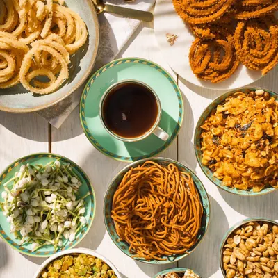 There is nothing quite like munching on your favourite snacks with a hot cup of coffee. This spread shows how my different snacks, from murukku to avarebele, can make your coffee time extra special.