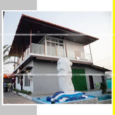The completed Rock Villa, featuring a prominent Merlion statue by the pool. This element adds a unique character to the farm resort, blending modern architectural lines with a touch of iconic sculpture.