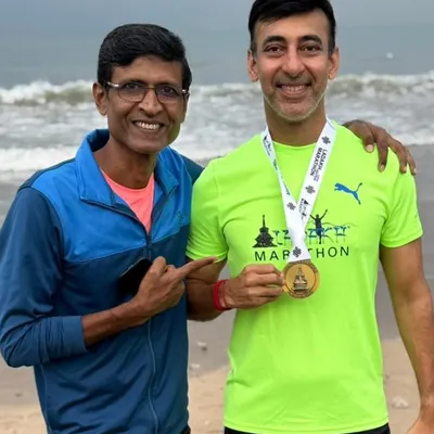 From Mumbai to the mountains. Our coach with an athlete after conquering the Ladakh Half Marathon. We are a team that travels and achieves together.
