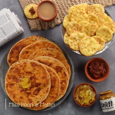 This is our idea of a perfect Sunday afternoon. A plate of warm, ghee-topped Missi Poori and a side of flaky Mathri, enjoyed with hot chai and a selection of our homemade pickles. It’s comfort food at its finest.