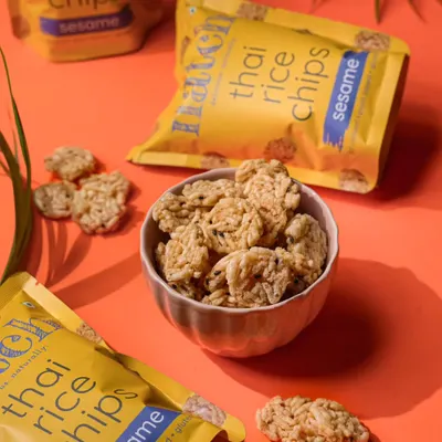For this packaged snack shoot, I used a vibrant, color-blocked background to make the product pop. The styling is clean and modern, showing how I create eye-catching images for brands that want to stand out.