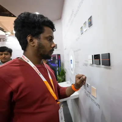 A visitor at the Smart Home Expo 2024 interacting with our Plus Premium keypad display. Events like these are a great opportunity for us to get direct feedback on our products.