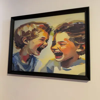This painting of laughing children on our wall perfectly captures the spirit of our studio. We believe joy and laughter are essential for learning.