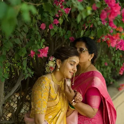 A mother's love. This tender moment between the bride and her mother before the ceremony is priceless. We look for these quiet, emotional interactions that tell a story of family, heritage, and love.