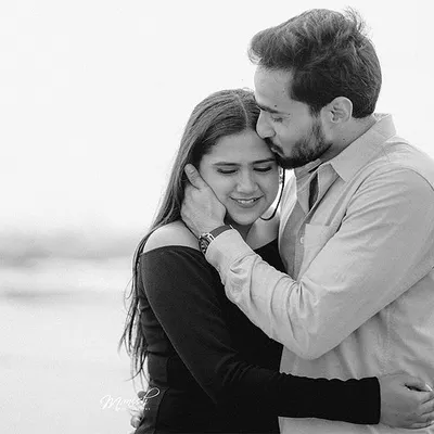 A tender black and white portrait, filled with emotion and intimacy. This classic style emphasizes the connection between the couple.