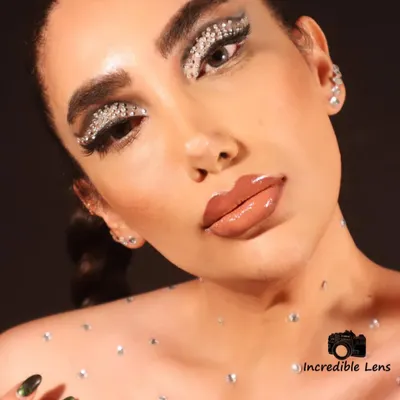 A full view of the rhinestone-encrusted eye makeup. I meticulously placed each stone to create a gradient of sparkle, resulting in a look that is pure fantasy and perfect for avant-garde projects or music videos.