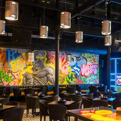 The finished mural for the new Lil Gamby restaurant in Parel. This project combined portraits, characters, and graffiti to create a vibrant, high-energy atmosphere for the space.