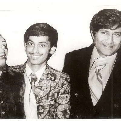 This vintage photo shows my father, Ramdas Padhye, with the legendary actor Dev Anand and our family's century-old puppet, Ardhavatrao. It's a beautiful reminder of our long history in the world of entertainment.