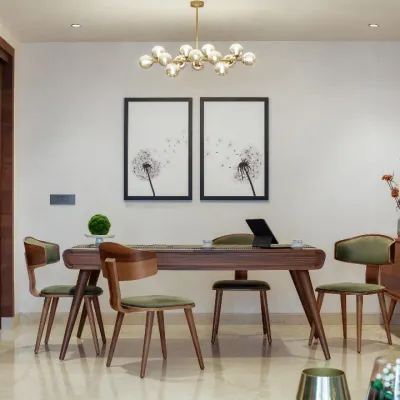 The dining space at Rue 32 is a symphony of wooden textures against an olive green backdrop. The detail-driven, custom-made dining table and chairs create an atmosphere of contemporary elegance, setting the stage for shared moments and connection.