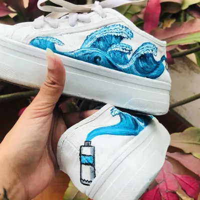 A closer look at the hand-painted shoes, turning old footwear into a piece of wearable ocean art. If you have an old pair of shoes you love, we can work together to give them a creative new beginning.