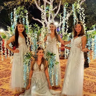 We also provide international artists for your events. These Russian performers, dressed in elegant gowns, are perfect for welcoming guests with a touch of glamour.