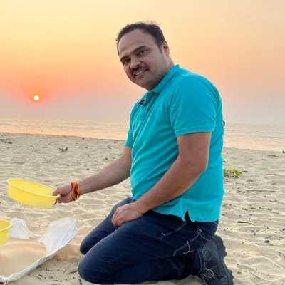 It all begins with sand. Here I am at the beach, the source of my primary material, connecting with the earth that inspires my work.