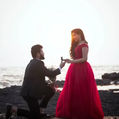 For a classic beach photoshoot, we provided this sharp black suit for the groom to be, which pairs perfectly with our red gown.