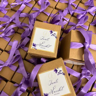 A large bulk order for Harshit and Twati's wedding, all packed and ready to go. The purple ribbon and custom label matched their theme perfectly.