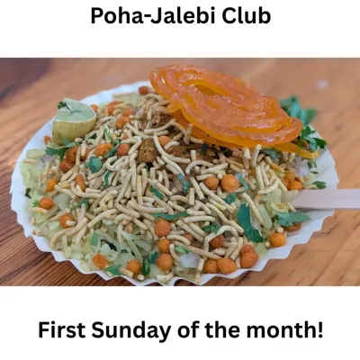 It all starts here. A delicious plate of Indori poha, topped with sev and a sweet jalebi. This isn't just food; it's a conversation starter and a piece of home that brings everyone to the table.