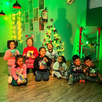 Our Powerpuff Beginners celebrating Christmas together. The studio is filled with smiles, laughter, and festive cheer.