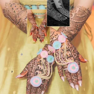 A detailed shot of bride Harshna's intricate mehndi design on her hands and feet, adorned with colorful gota patti jewelry.