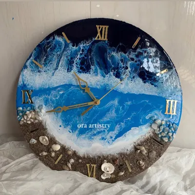 A stunning ocean-themed resin clock, complete with crashing waves, a sandy shore, and real shells. This is one of my most requested workshop projects.