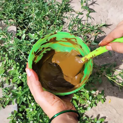 This is where the magic begins. I mix my own 100% organic henna paste to ensure it is safe for your skin and yields the richest, darkest stain possible.