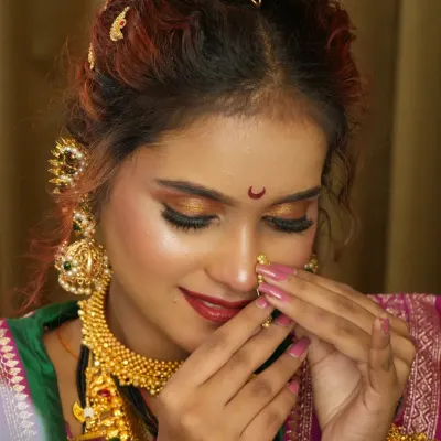 A close-up of the Peshwai bridal look, focusing on the expressive eye makeup and the placement of the traditional nath. These are the details that bring the entire look to life.