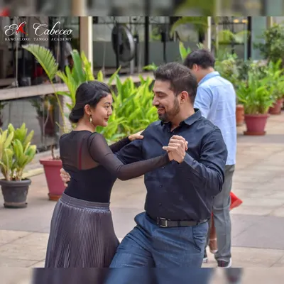 A candid moment of joy and communication between two dancers at our U B City flash mob. This is what learning Tango is all about.