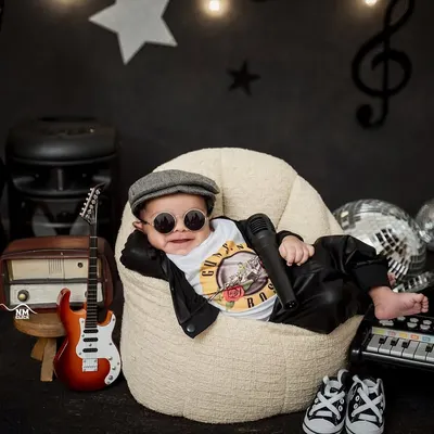 Get ready to meet a future rockstar. Our creative studio sessions allow your child's personality to shine, and we had so much fun putting together this cool, musical-themed shoot.
