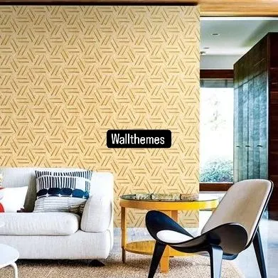 A living room with a modern geometric wallpaper in a repeating hexagonal pattern, creating a subtle yet stylish feature wall.