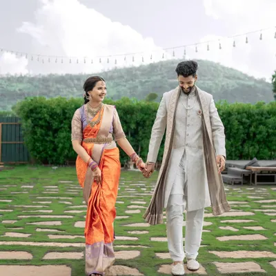 Our client Anusha begins her forever journey, draped in a stunning lavender and red silk saree for her engagement. This piece perfectly harmonizes delicate lavender with passionate red, symbolizing a beautiful new chapter.