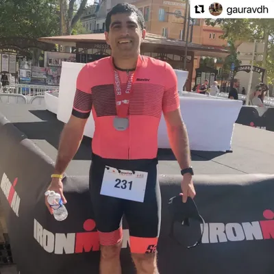 The moment of triumph. Gaurav proudly displaying his finisher medal after conquering the IRONMAN 70.3 in France. A testament to his hard work and our dedicated coaching partnership.
