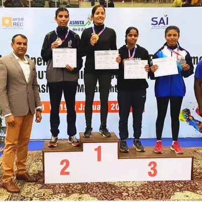 Gold for our champion. We celebrate Aakansha Singh on the winner's podium after securing the gold medal at the Khelo India Boxing competition. Her victory is a testament to her hard work and the spirit of our academy.