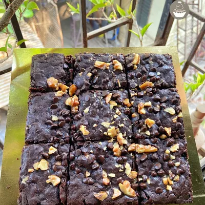 My classic Chocochip Walnut Brownies are a customer favorite. They are fudgy, loaded with chocolate chips and crunchy walnuts, and perfect for any occasion.