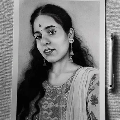 Here is a finished A4 size commission of a beautiful client. I focused on the soft texture of her hair and the intricate patterns on her traditional attire, using different grades of graphite pencils to achieve depth.