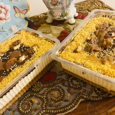 My bestselling Twixter dessert, a heavenly mix of chocolate, caramel, and biscuit layers, loaded with Twix chocolates. It's light, creamy, and a must-try.